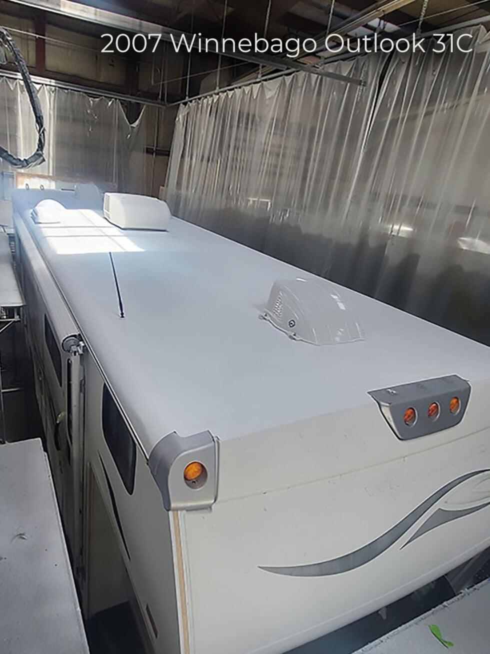 Class C RV in Arizona getting roof repaired