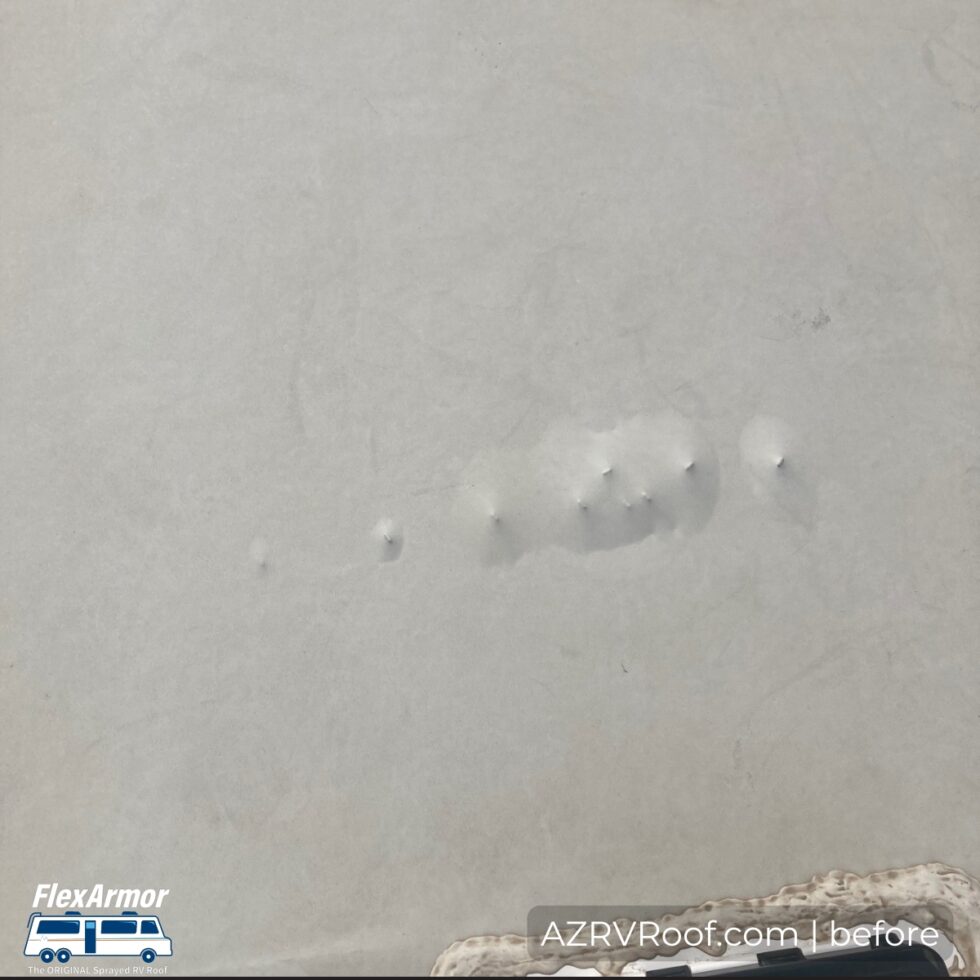 rv roof with staples tearing buckled membrane